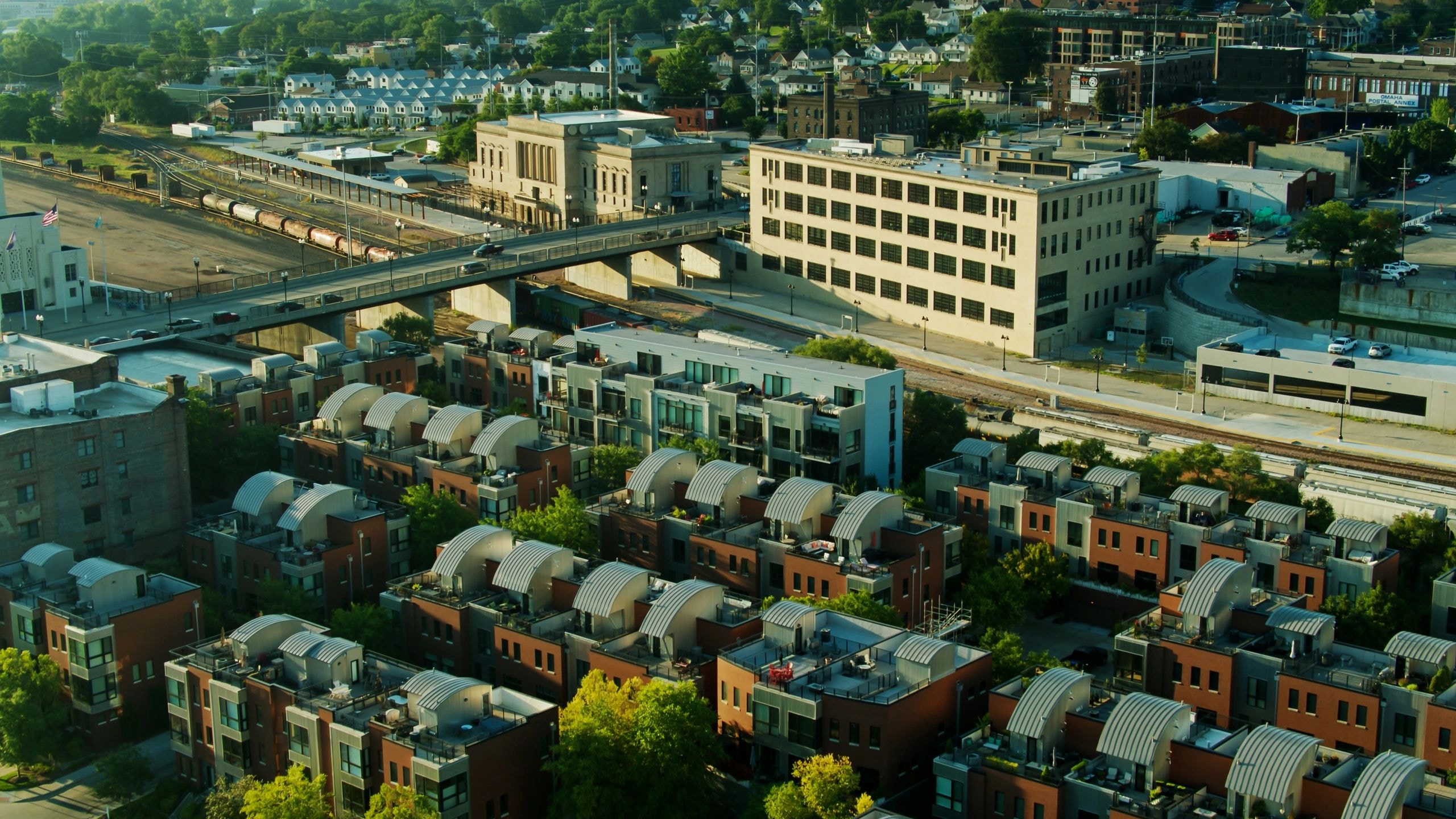 Aerial view of urban neighborhood with mixed residential and commercial buildings